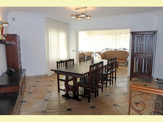 Large dining room with adjacent games room